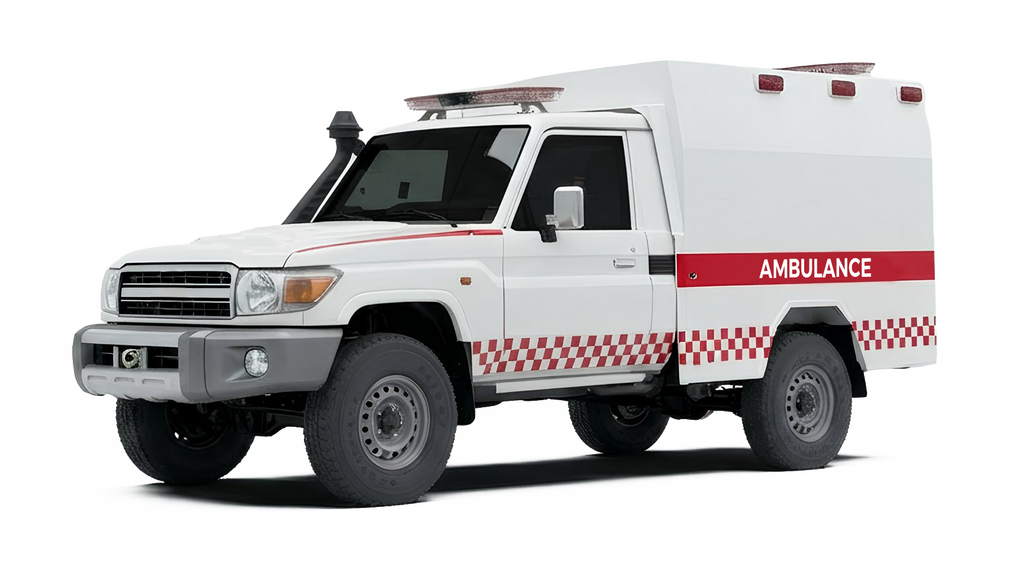 A white ambulance with red and white checkered stripes, set against a black background.